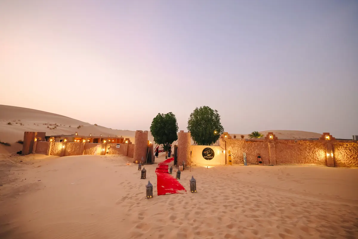 Sunset over the dunes at Khayal Al Sahra camp