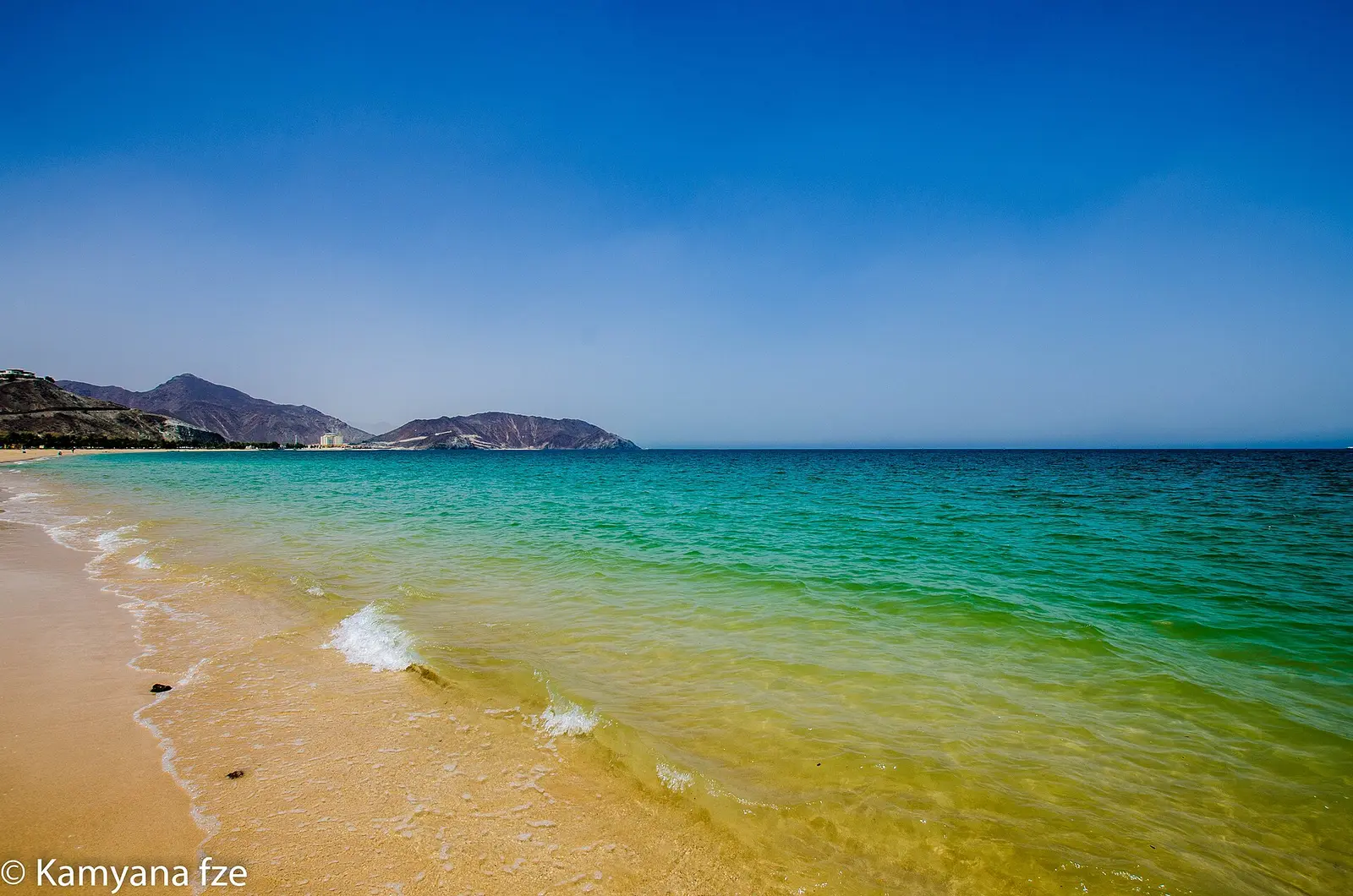 Turquoise water on the beach at Khor Fakkan